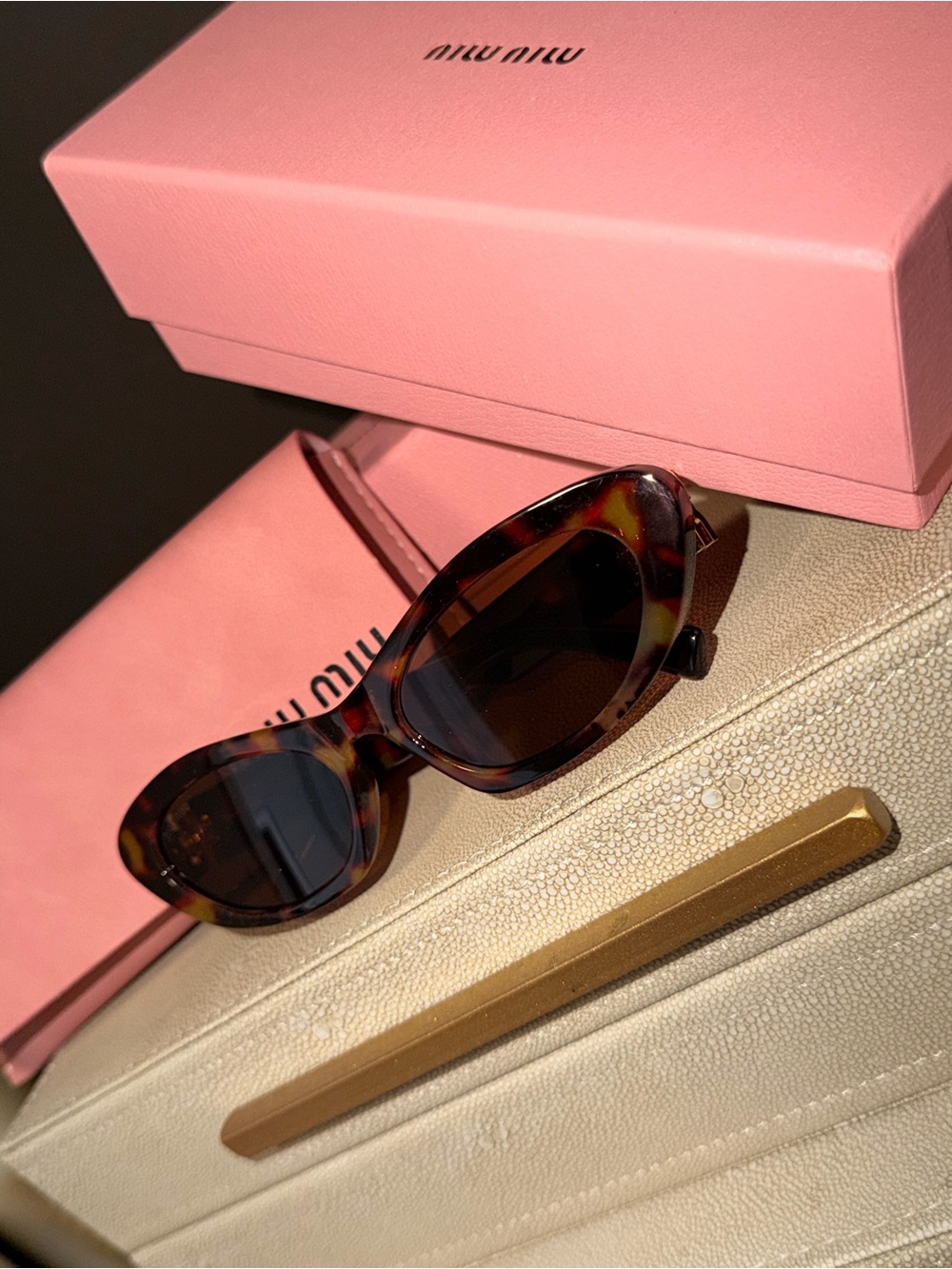 Miu Miu Tortoiseshell Oval Sunglasses with Brown Lenses
